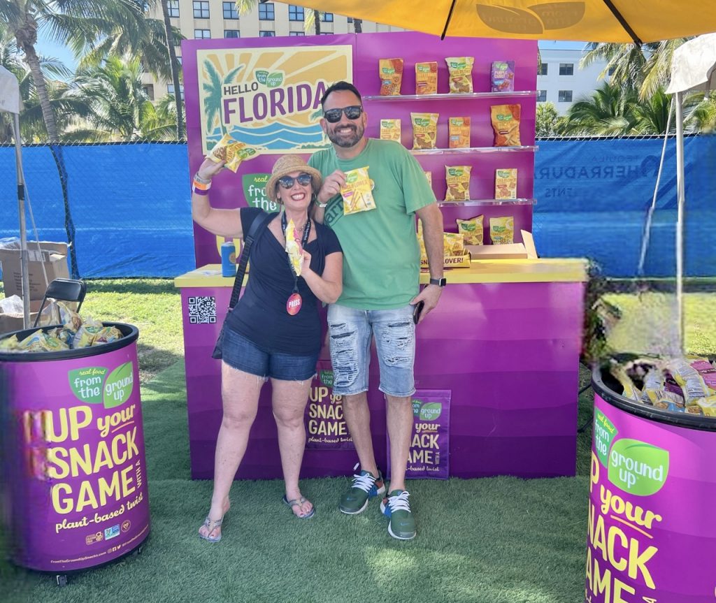 a couple near a Hello Florida Snack Stall