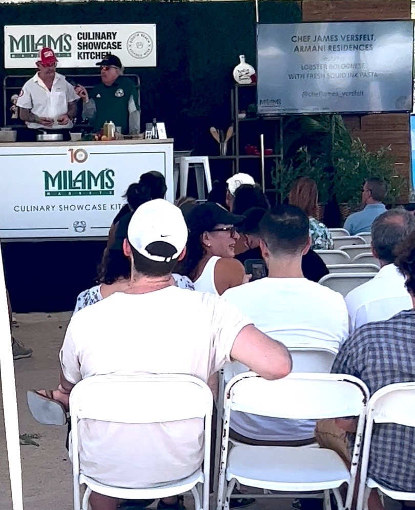 People sitting on chairs at Milams Event